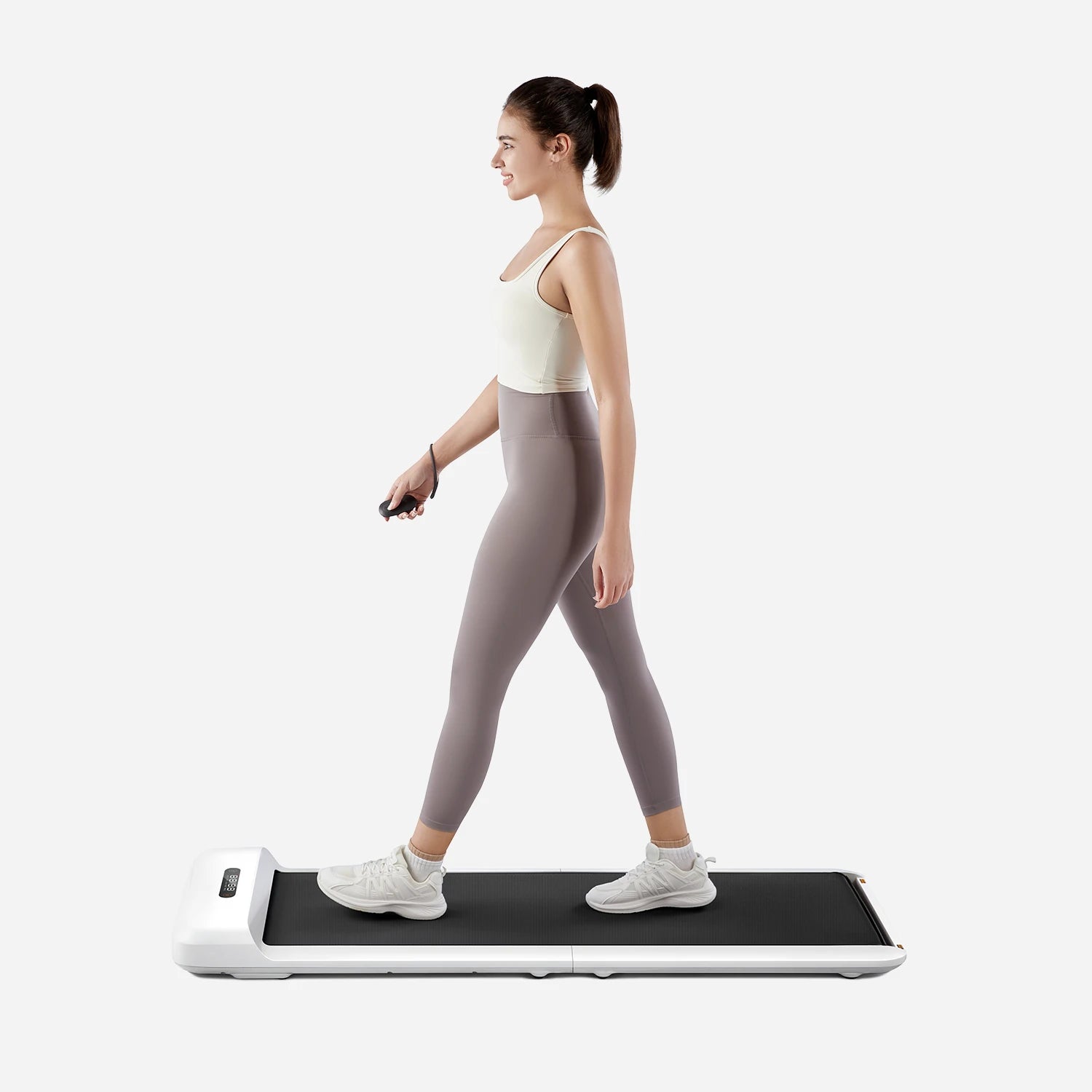 WalkingPad C2 being used in a home